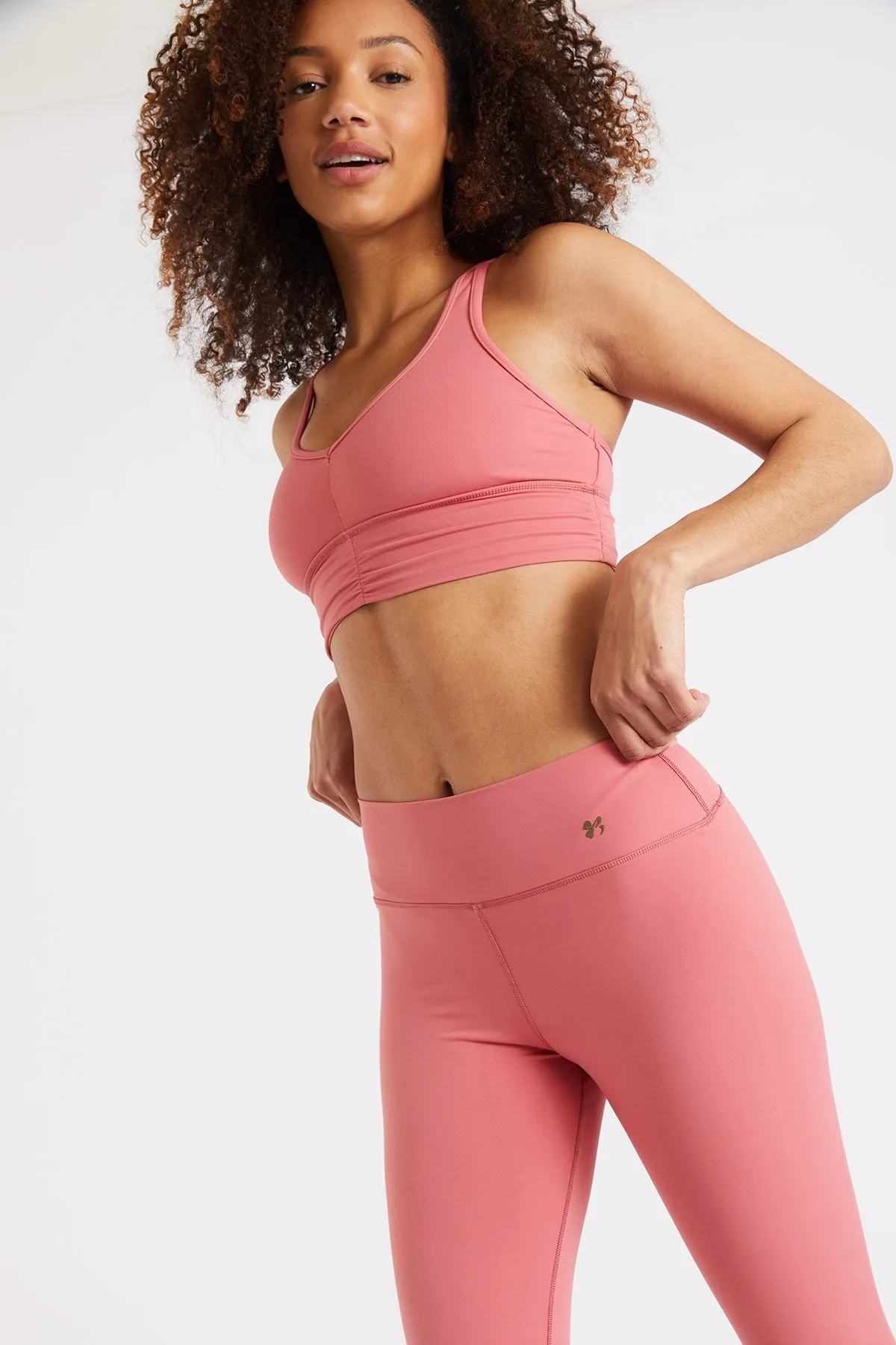 Flow Wellness pink sports bra