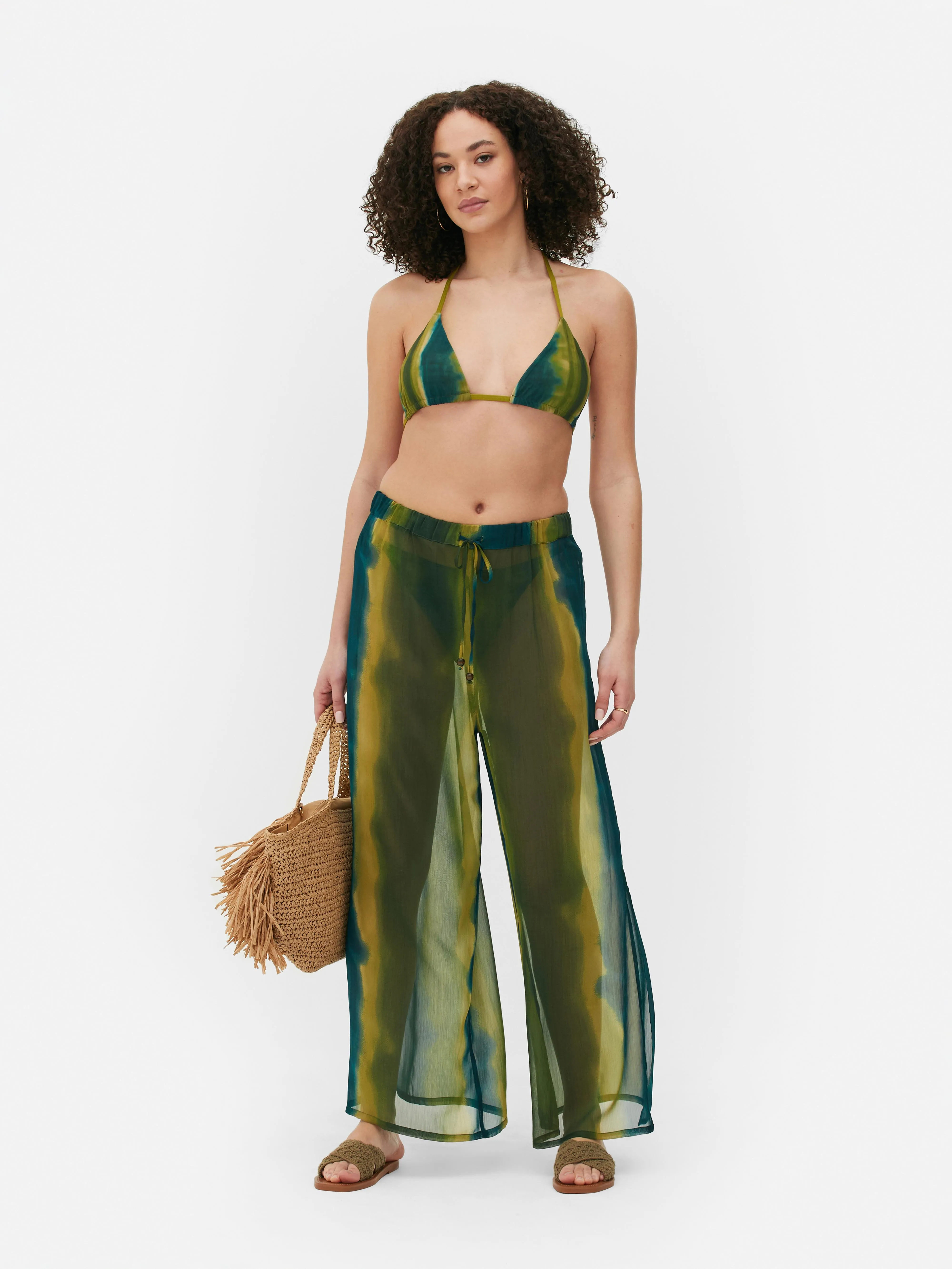 Pantalones playeros anchos con laterales abiertos
