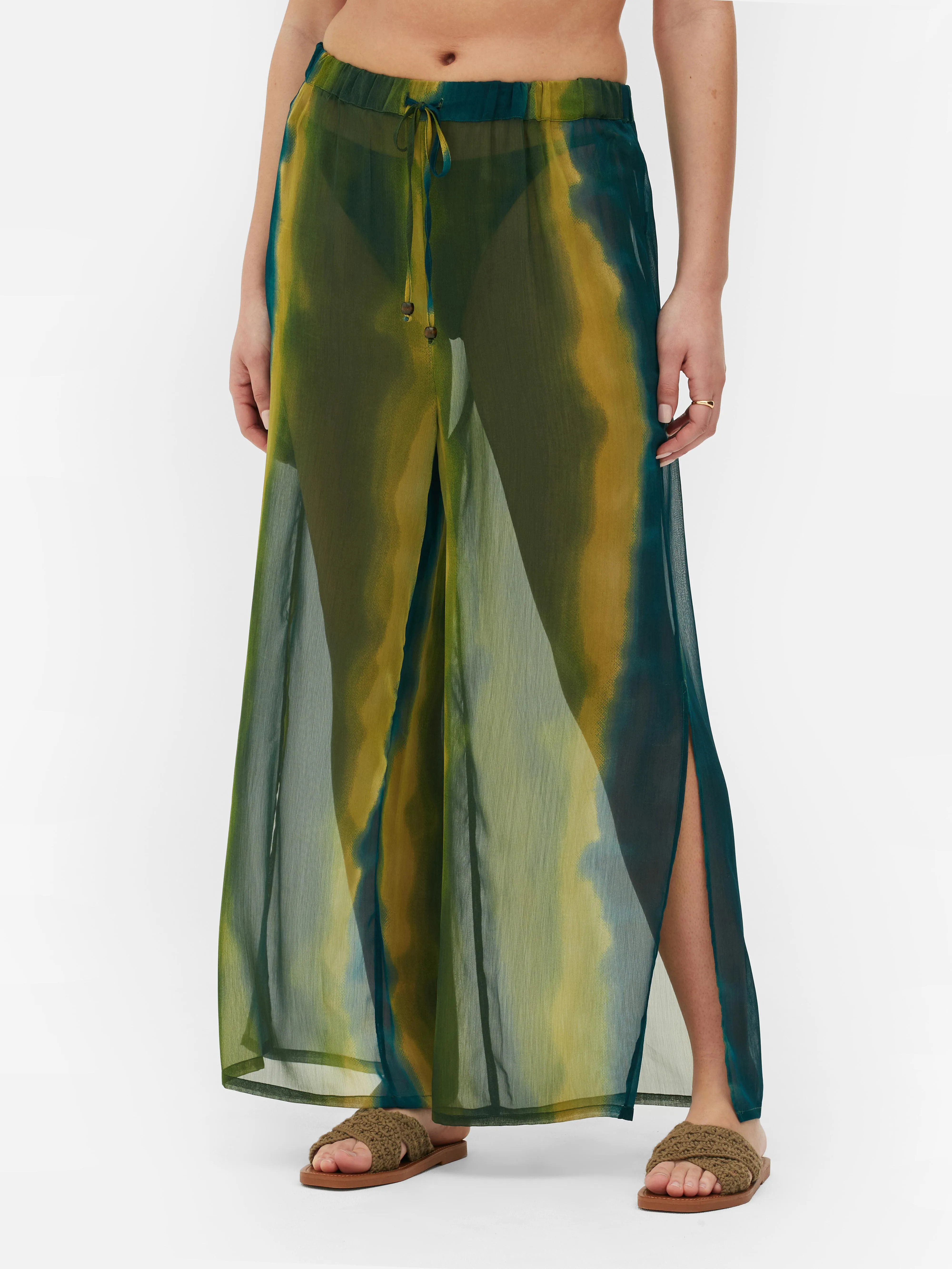 Pantalones playeros anchos con laterales abiertos