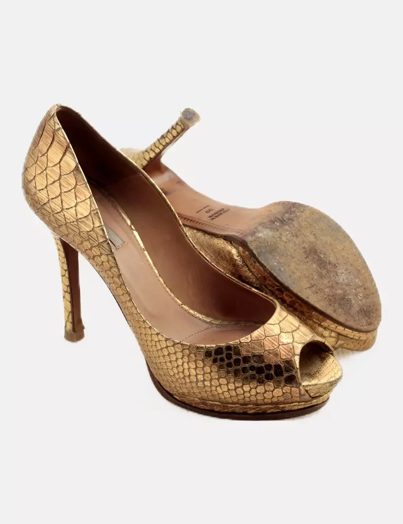 Uterqüe Zapato dorado estampado